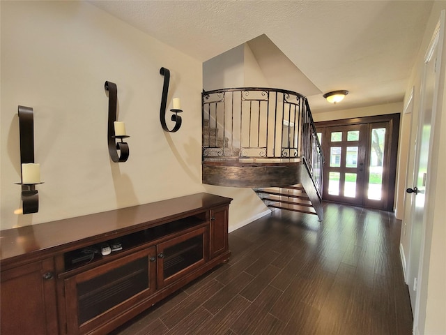 711 Holly Springs Dr, Conroe, TX 77302 - foyer featuring stairway and dark wood-style floors
