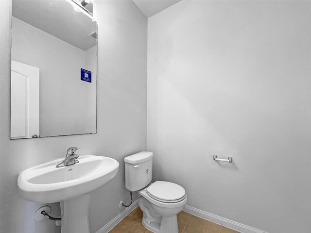 211 Golden Eagle Ct, La Marque, TX 77568 - bathroom with baseboards and tile patterned flooring