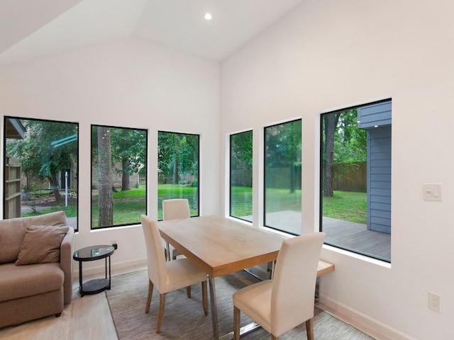 2812 Crossvine, The Woodlands, TX 77380 - dining space with baseboards and lofted ceiling