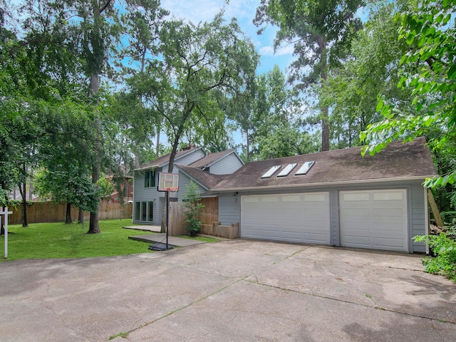 2812 Crossvine, The Woodlands, TX 77380 - view of front facade featuring driveway and an attached garage