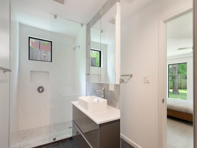2812 Crossvine, The Woodlands, TX 77380 - full bath featuring walk in shower, vanity, ensuite bath, and tasteful backsplash