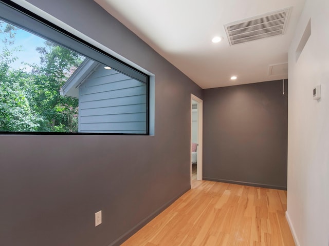 2812 Crossvine, The Woodlands, TX 77380 - hallway with wood finished floors and recessed lighting