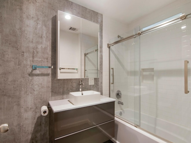2812 Crossvine, The Woodlands, TX 77380 - bathroom with enclosed tub / shower combo and vanity