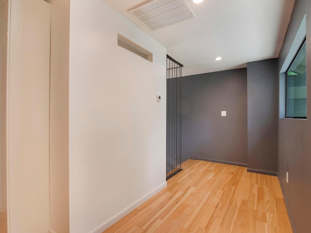 2812 Crossvine, The Woodlands, TX 77380 - spare room featuring light wood finished floors and recessed lighting