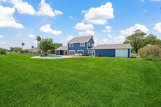 11320 Cedar Gully Rd, Beach City, TX 77523 - rear view of property with a hot tub, an attached garage, and a patio