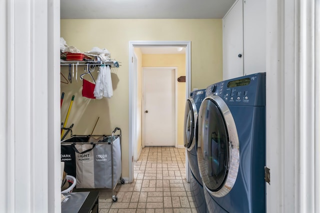 2731 Manila Ln, Houston, TX 77043 - laundry area featuring separate washer and dryer and cabinet space