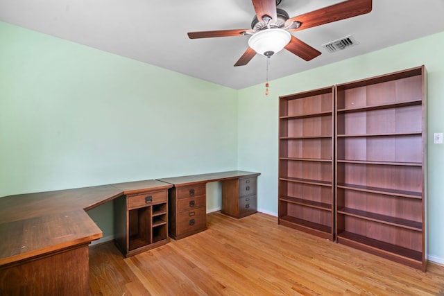 2731 Manila Ln, Houston, TX 77043 - unfurnished office with light wood finished floors and a ceiling fan