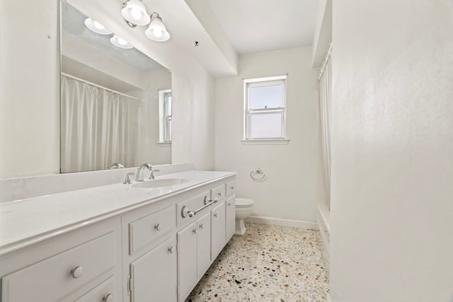 2731 Manila Ln, Houston, TX 77043 - bathroom with speckled floor, vanity, and curtained shower