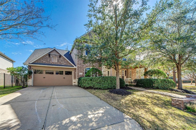 18219 S Austin Shore Dr, Cypress, TX 77433 - view of front of house with concrete driveway, stone siding, and an attached garage