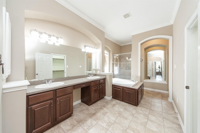 18219 S Austin Shore Dr, Cypress, TX 77433 - bathroom with double vanity, a stall shower, crown molding, a garden tub, and tile patterned floors