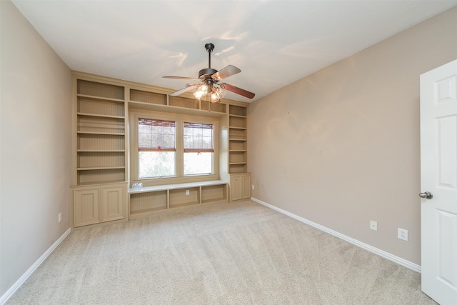 18219 S Austin Shore Dr, Cypress, TX 77433 - spare room with ceiling fan, carpet, and built in features