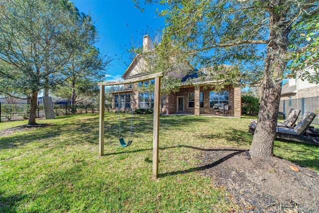 18219 S Austin Shore Dr, Cypress, TX 77433 - back of house featuring a fenced backyard, a chimney, and brick siding