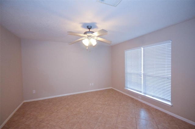 6906 Grant Dr, Magnolia, TX 77354 - unfurnished room featuring a ceiling fan and baseboards