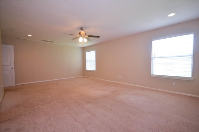 6906 Grant Dr, Magnolia, TX 77354 - empty room featuring recessed lighting, light carpet, and a ceiling fan