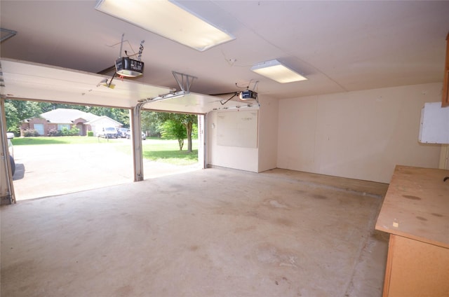 6906 Grant Dr, Magnolia, TX 77354 - garage with a garage door opener