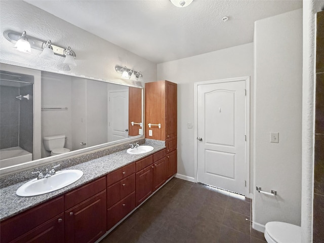 1711 Old Spanish Trl Unit 240, Houston, TX 77054 - full bathroom with double vanity and tile patterned floors