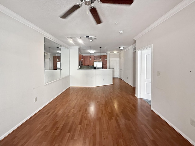 1711 Old Spanish Trl Unit 240, Houston, TX 77054 - unfurnished living room featuring ornamental molding, a ceiling fan, and dark wood-type flooring