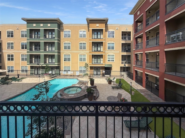 1711 Old Spanish Trl Unit 240, Houston, TX 77054 - view of pool with a pool with connected hot tub and a patio