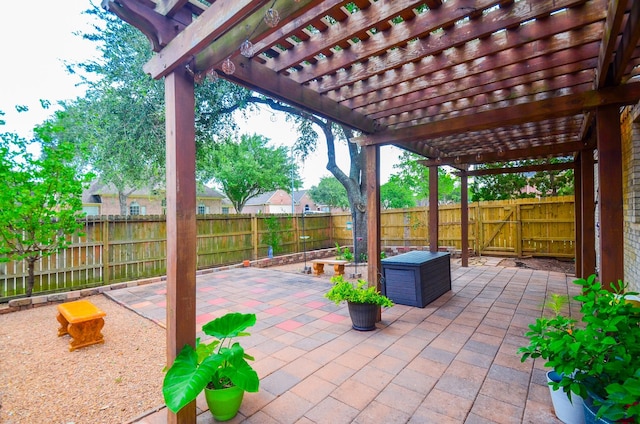 1501 Mulberry Ct, Pearland, TX 77581 - fenced backyard featuring a patio and a pergola