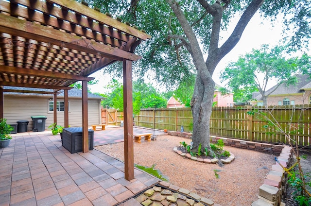 1501 Mulberry Ct, Pearland, TX 77581 - fenced backyard featuring a pergola and a patio