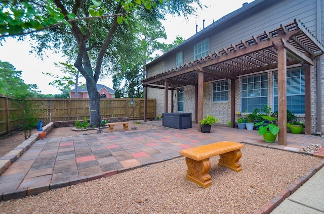 1501 Mulberry Ct, Pearland, TX 77581 - fenced backyard with a pergola and a patio area
