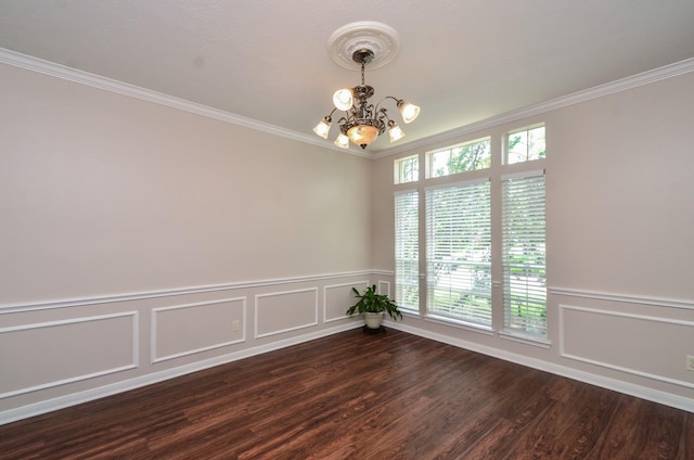 1501 Mulberry Ct, Pearland, TX 77581 - spare room with a chandelier, crown molding, wood finished floors, a decorative wall, and a wainscoted wall