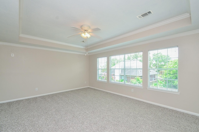 1501 Mulberry Ct, Pearland, TX 77581 - carpeted empty room with a raised ceiling, ornamental molding, and ceiling fan