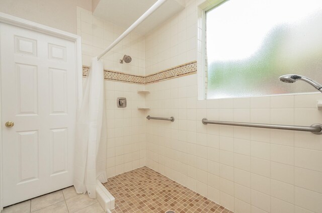 1501 Mulberry Ct, Pearland, TX 77581 - full bath with tiled shower and tile patterned flooring