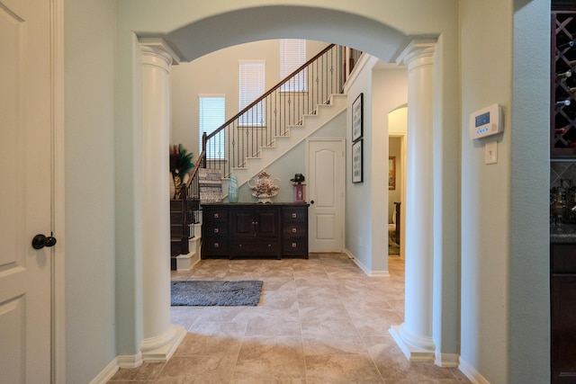 14907 Ashley Creek Ct, Humble, TX 77396 - entryway featuring decorative columns, arched walkways, and stairs