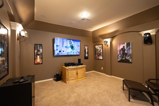 14907 Ashley Creek Ct, Humble, TX 77396 - home theater room with light carpet and decorative columns