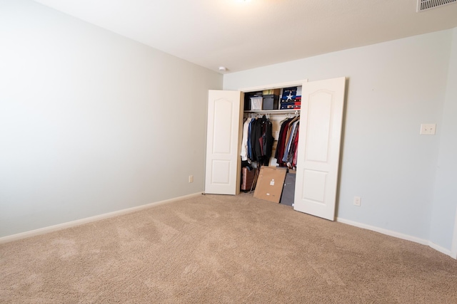 14907 Ashley Creek Ct, Humble, TX 77396 - unfurnished bedroom with light colored carpet and a closet