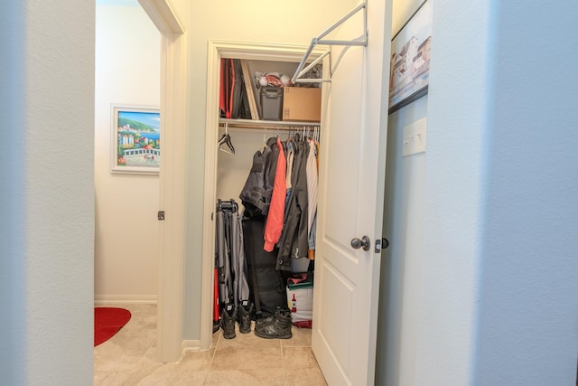 14907 Ashley Creek Ct, Humble, TX 77396 - walk in closet featuring tile patterned flooring