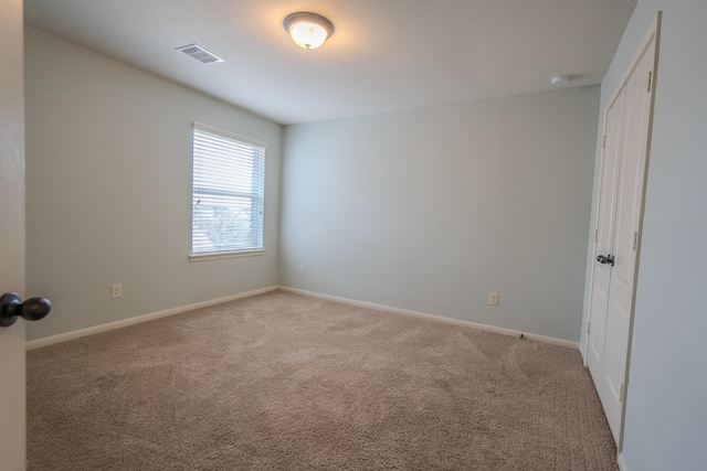 14907 Ashley Creek Ct, Humble, TX 77396 - spare room featuring light colored carpet