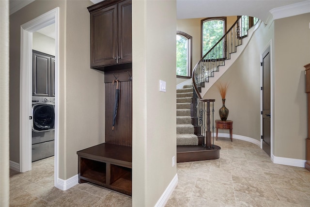 42015 Mill Creek Rd, Magnolia, TX 77354 - mudroom with washer / clothes dryer, light stone finish flooring, and crown molding