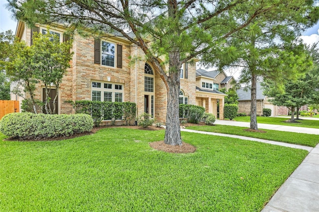 25827 Austin Spgs, Spring, TX 77373 - traditional home with driveway and brick siding