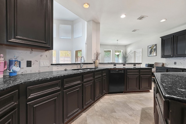 25827 Austin Spgs, Spring, TX 77373 - kitchen with black dishwasher, dark stone countertops, and recessed lighting