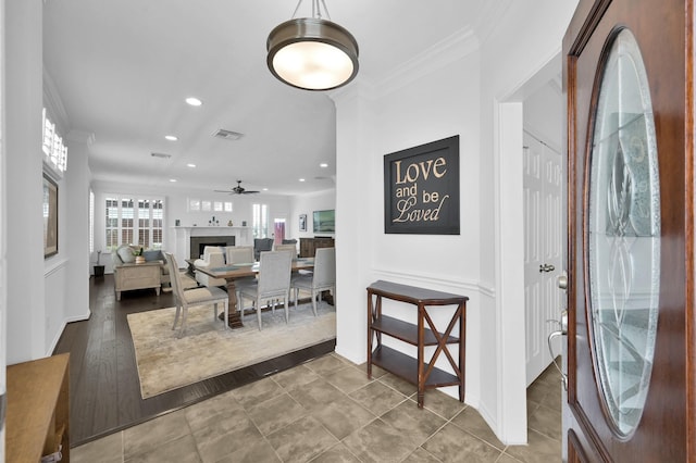 905 Wakefield Dr, Houston, TX 77018 - tiled dining space featuring ornamental molding, recessed lighting, a ceiling fan, and a fireplace