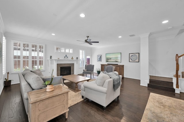 905 Wakefield Dr, Houston, TX 77018 - living room featuring crown molding, a glass covered fireplace, a ceiling fan, stairs, and recessed lighting