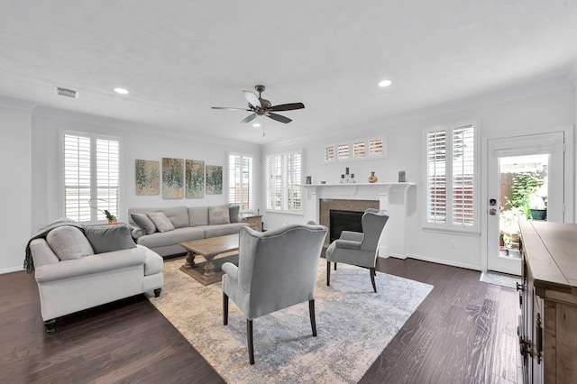 905 Wakefield Dr, Houston, TX 77018 - living area featuring ceiling fan, recessed lighting, a fireplace, and dark wood-type flooring