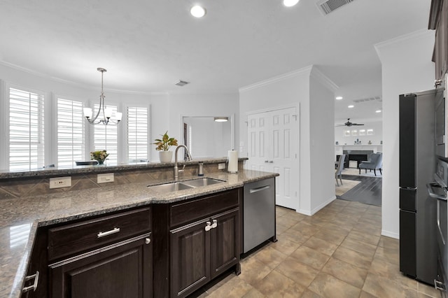 905 Wakefield Dr, Houston, TX 77018 - kitchen featuring dishwasher, dark brown cabinets, a chandelier, stone counters, and crown molding