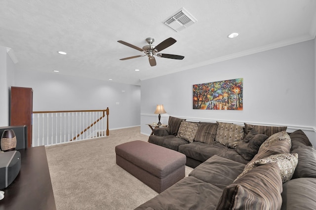 905 Wakefield Dr, Houston, TX 77018 - carpeted living room with a ceiling fan, recessed lighting, and ornamental molding
