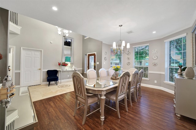 27115 Meadow Sage Ct, Cypress, TX 77433 - dining area featuring a chandelier, dark wood-style floors, recessed lighting, and ornamental molding