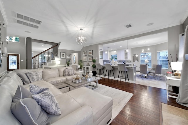 27115 Meadow Sage Ct, Cypress, TX 77433 - living room featuring a chandelier, stairway, light wood-style floors, and ornamental molding