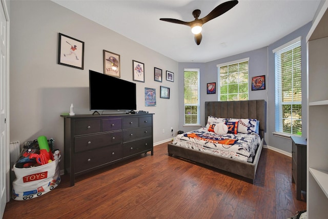 27115 Meadow Sage Ct, Cypress, TX 77433 - bedroom with dark wood-style floors and a ceiling fan