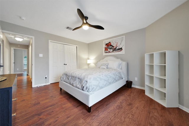 27115 Meadow Sage Ct, Cypress, TX 77433 - bedroom featuring attic access, dark wood-style flooring, a closet, and ceiling fan