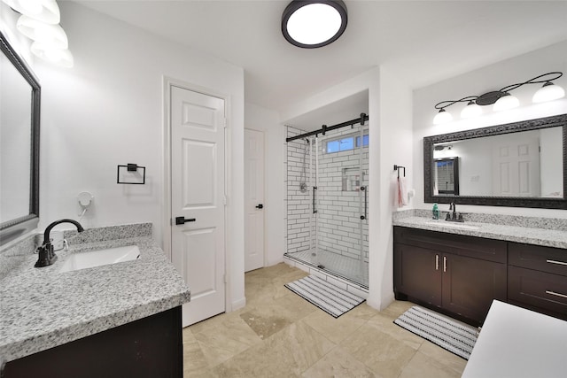 27115 Meadow Sage Ct, Cypress, TX 77433 - bathroom featuring a stall shower and two vanities
