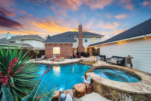 27115 Meadow Sage Ct, Cypress, TX 77433 - view of pool with a patio area, a fenced backyard, and a pool with connected hot tub