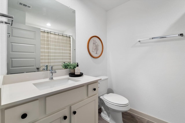 14906 Rain Tree Dr, Baytown, TX 77523 - bathroom featuring wood finished floors, vanity, and curtained shower