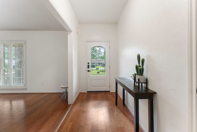 25607 Spring Ridge Dr, Spring, TX 77386 - foyer entrance featuring plenty of natural light and wood finished floors