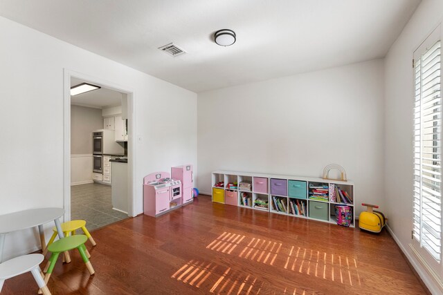 25607 Spring Ridge Dr, Spring, TX 77386 - recreation room featuring wood finished floors